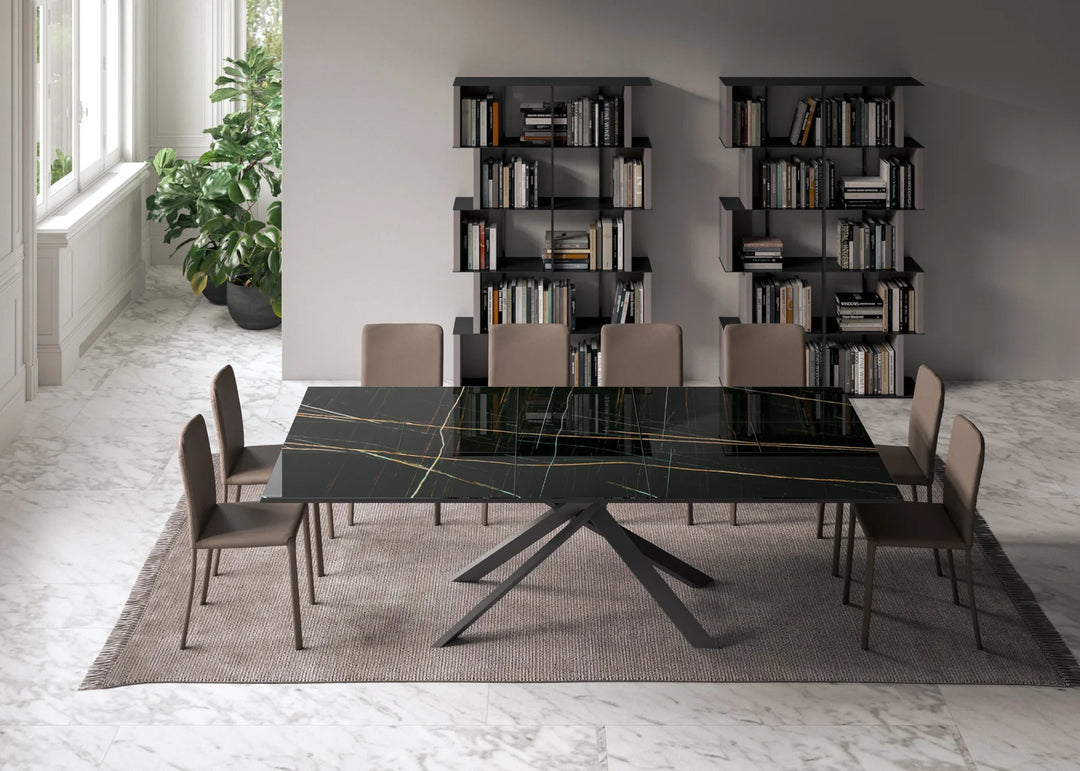 Dining room with the 4x4  black marble table and chairs in a modern interior setting.