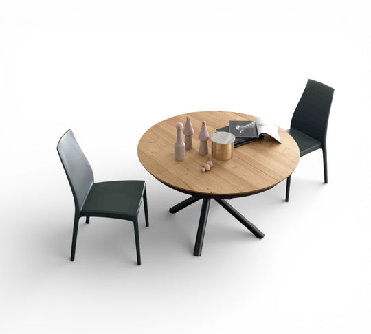 BB Round wooden table with black metal legs and two chairs on a white background