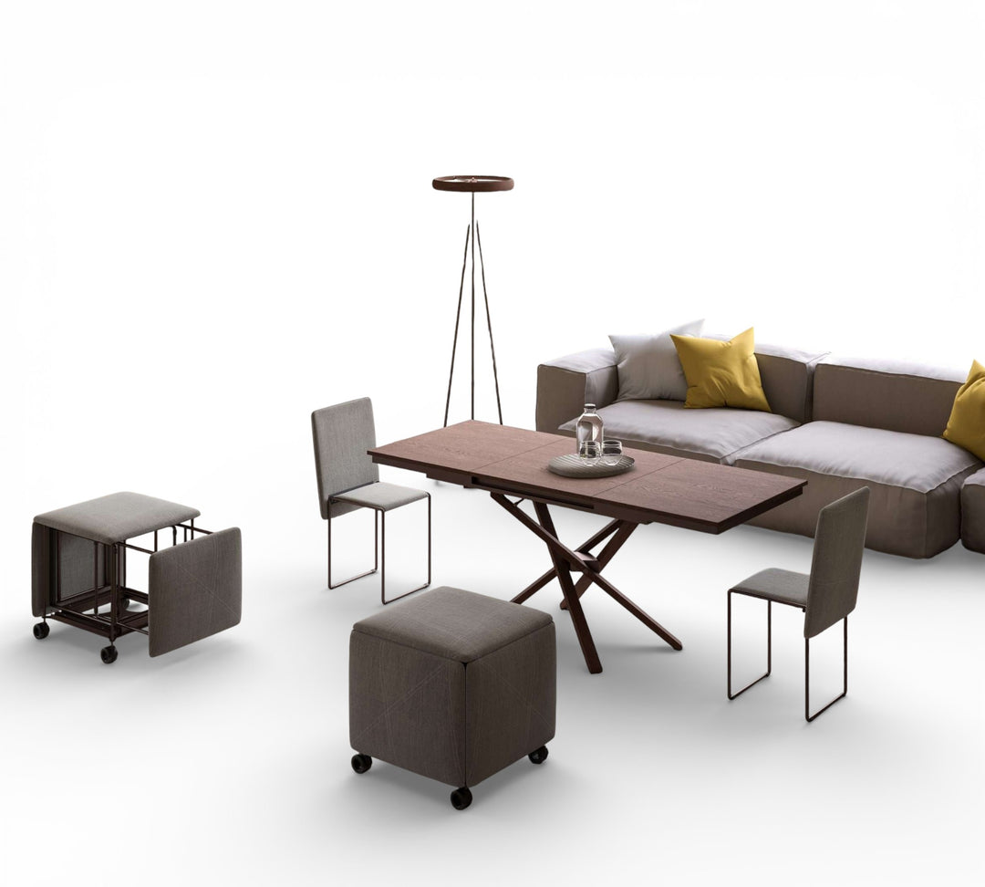 Modern living room with a sofa, table, chairs and ottoman on a white background