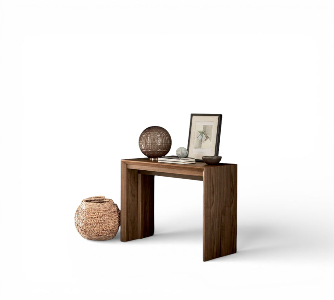 Goliath wooden console table with decorative items on a white background