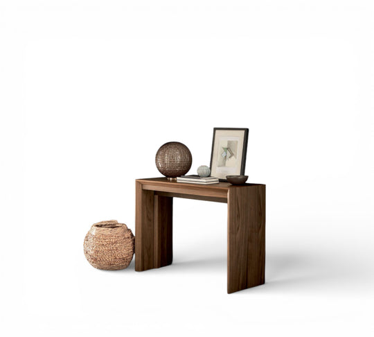 Goliath wooden console table with decorative items on a white background