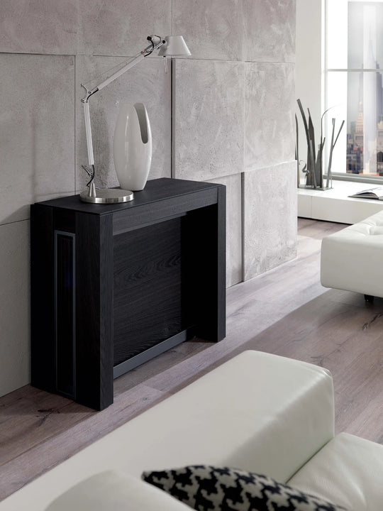 Modern living room with a black A4 console table and white sofa.