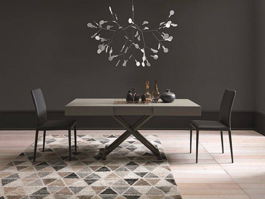 Boxy adjustable in height transforming coffee to dining table