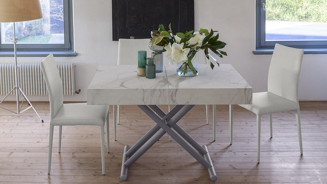Boxy dining table in white marble