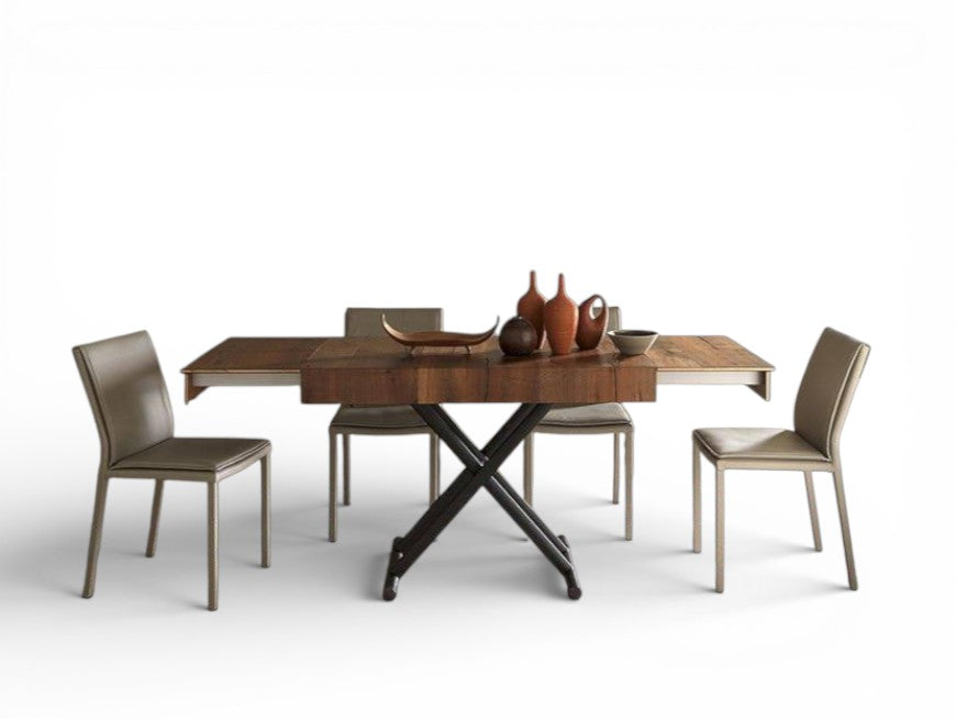 Boxy New extendable dining table with four chairs on a white background