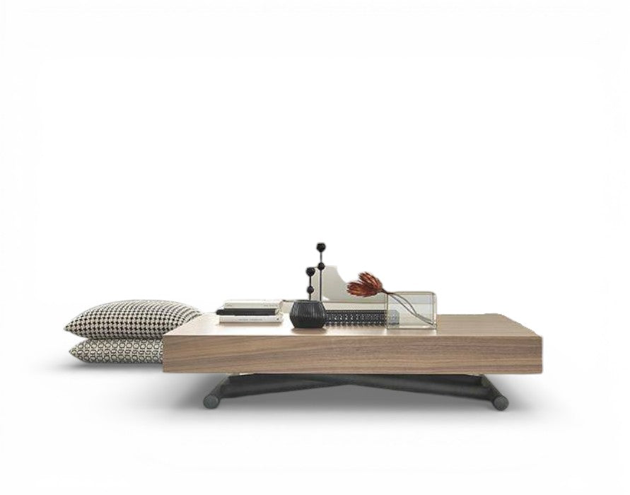 Cubic modern coffee table with decorative items on a white background