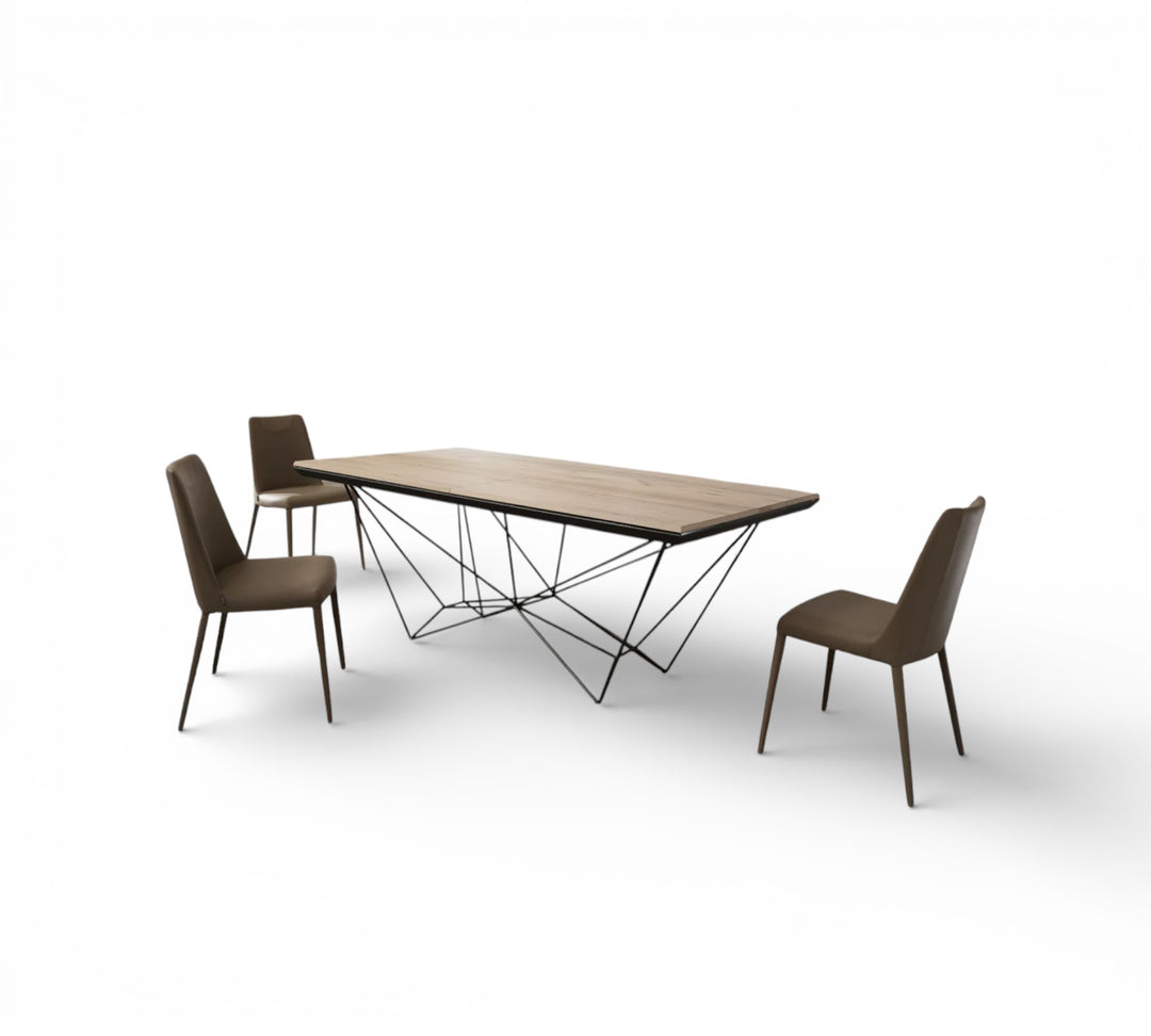 Fil 8 Dining table with geometric base and chairs on a white background
