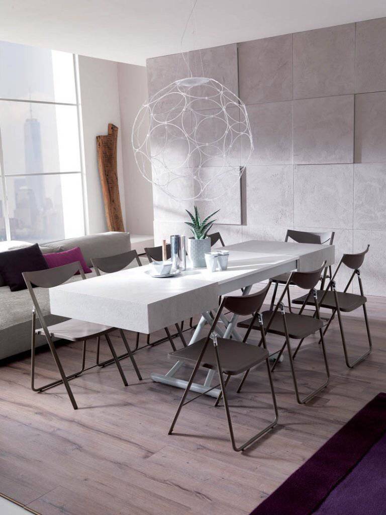 Box coffee lifted and extended as a dining table 