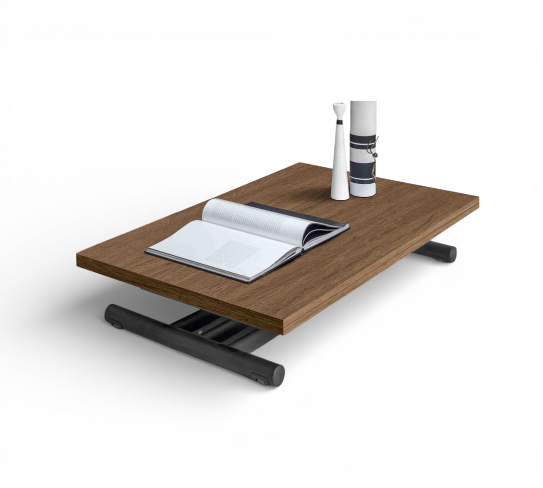 Wooden Phoenix table with an open book and two cylindrical objects on a white background