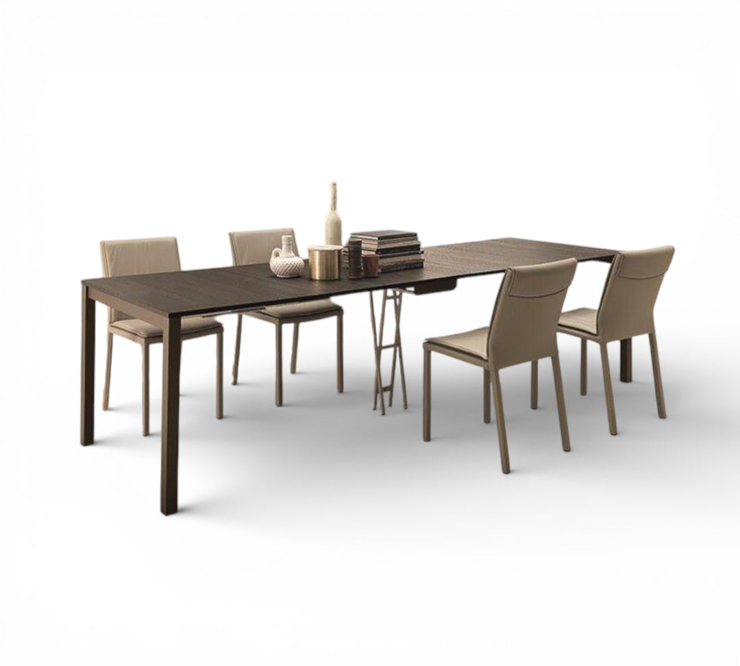 Quebec dining table with four chairs on a white background