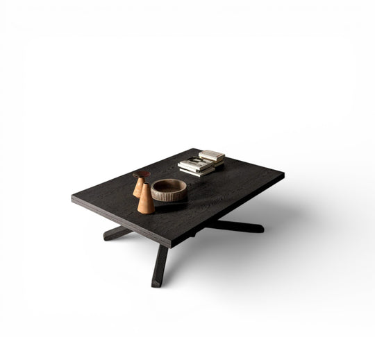 SU E GIU dark wooden coffee table with decorative items on a white background