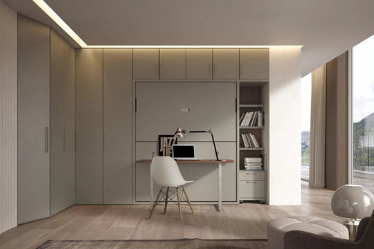 Workstation wall bed creating a modern office space with storage and bookshelf.